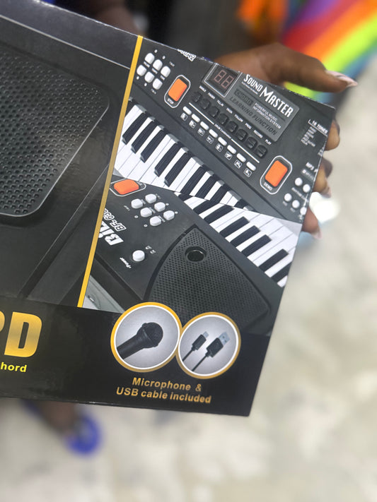 Piano Électronique 61 Touches + Micro – Le Cadeau Parfait Pour Éveiller le Talent Musical de Votre Enfant